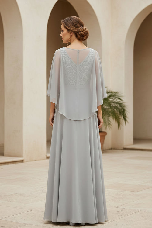 Vestido de noche de línea A con corpiño de encaje y capa de gasa en las mangas