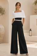 Wide-Leg Capelet Jumpsuit with Back Bow